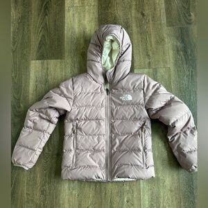 The North Face Reversible Coat.  Girl’s size medium (10). Great used condition.
